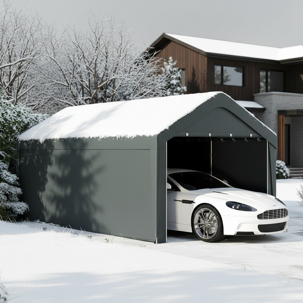 White car parked inside a snow-covered metal garage in front of a house with snow on the roof.