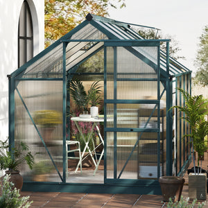 Greenhouse with a view into a garden area with plants and furniture