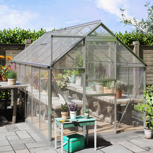 Greenhouse with plants and outdoor furniture on a sunny day