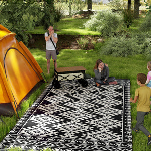 Outsunny Reversible Outdoor Rug, 9' x 18' Waterproof Plastic Straw Floor Mat, Portable RV Camping Carpet, Large Floor Mat for Backyard, Deck, Picnic, Beach, Black & White Rhombus Border