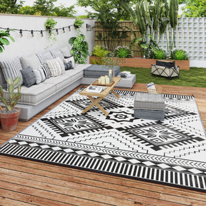 Outsunny Reversible Outdoor Rug, 9' x 12' Waterproof Plastic Straw Floor Mat, Portable RV Camping Carpet, Large Floor Mat for Backyard, Deck, Picnic, Beach, White & Black Toothed Rhombus