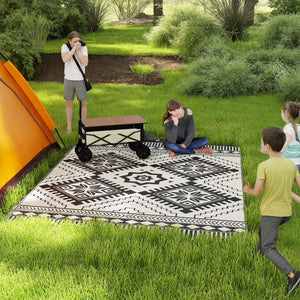 Outsunny Reversible Outdoor Rug, 9' x 12' Waterproof Plastic Straw Floor Mat, Portable RV Camping Carpet, Large Floor Mat for Backyard, Deck, Picnic, Beach, White & Black Toothed Rhombus