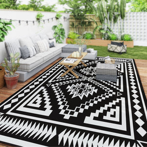 Outsunny Reversible Outdoor Rug, 9' x 18' Waterproof Plastic Straw Floor Mat, Portable RV Camping Carpet, Large Floor Mat for Backyard, Deck, Picnic, Beach, Black & White Square Patchwork